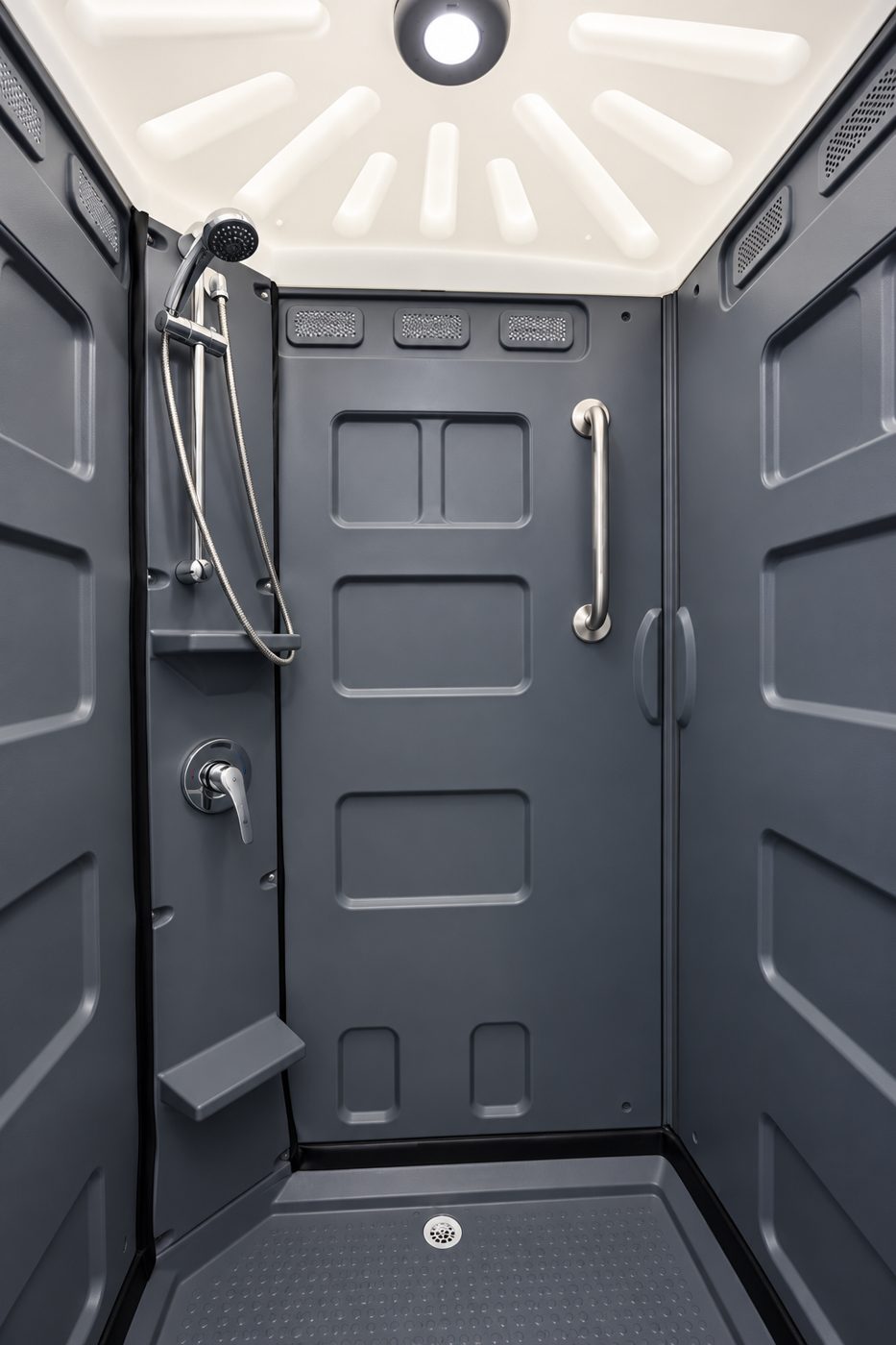 Inside: hand-held shower, mixer tap, grab rail and non-slip floor